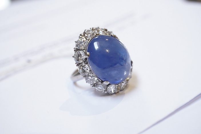 A sapphire and diamond ring, mid 20th century